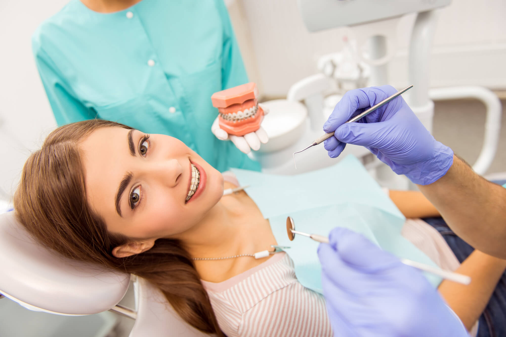 woman in dental chair for orthodontics in pembroke pines follow up appointment